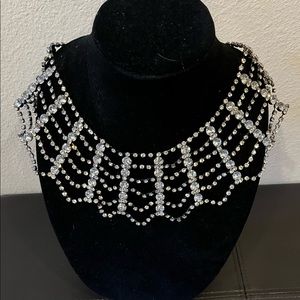 Rhinestone crystal-like statement collar necklace.
